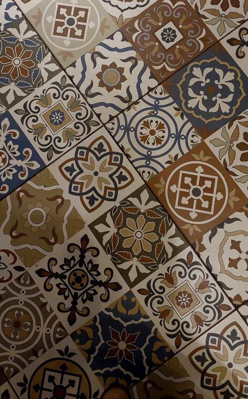 tile installer laying ceramic floor